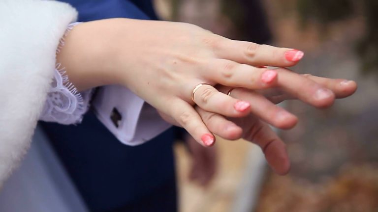 Couple holding hands on wedding love AnteAr